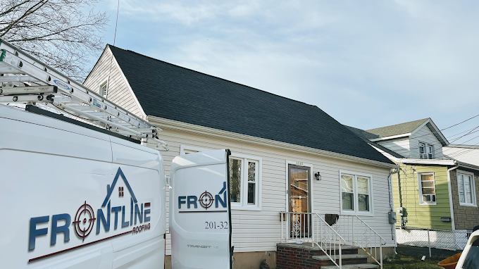 Front Line Van in front of a Roof Replacement in Paramus,NJ