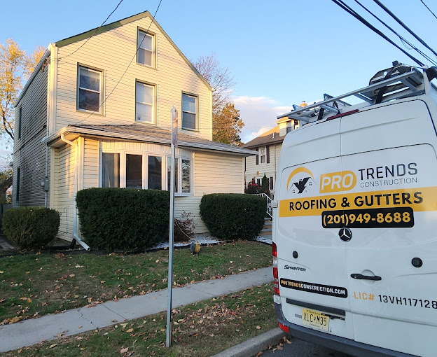Pro Trends Construction Van in front of a roof replacement in Fair Lawn, NJ