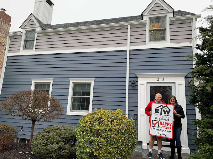 RJW Exterior -happy customers from Clifton, NJ after a siding job 